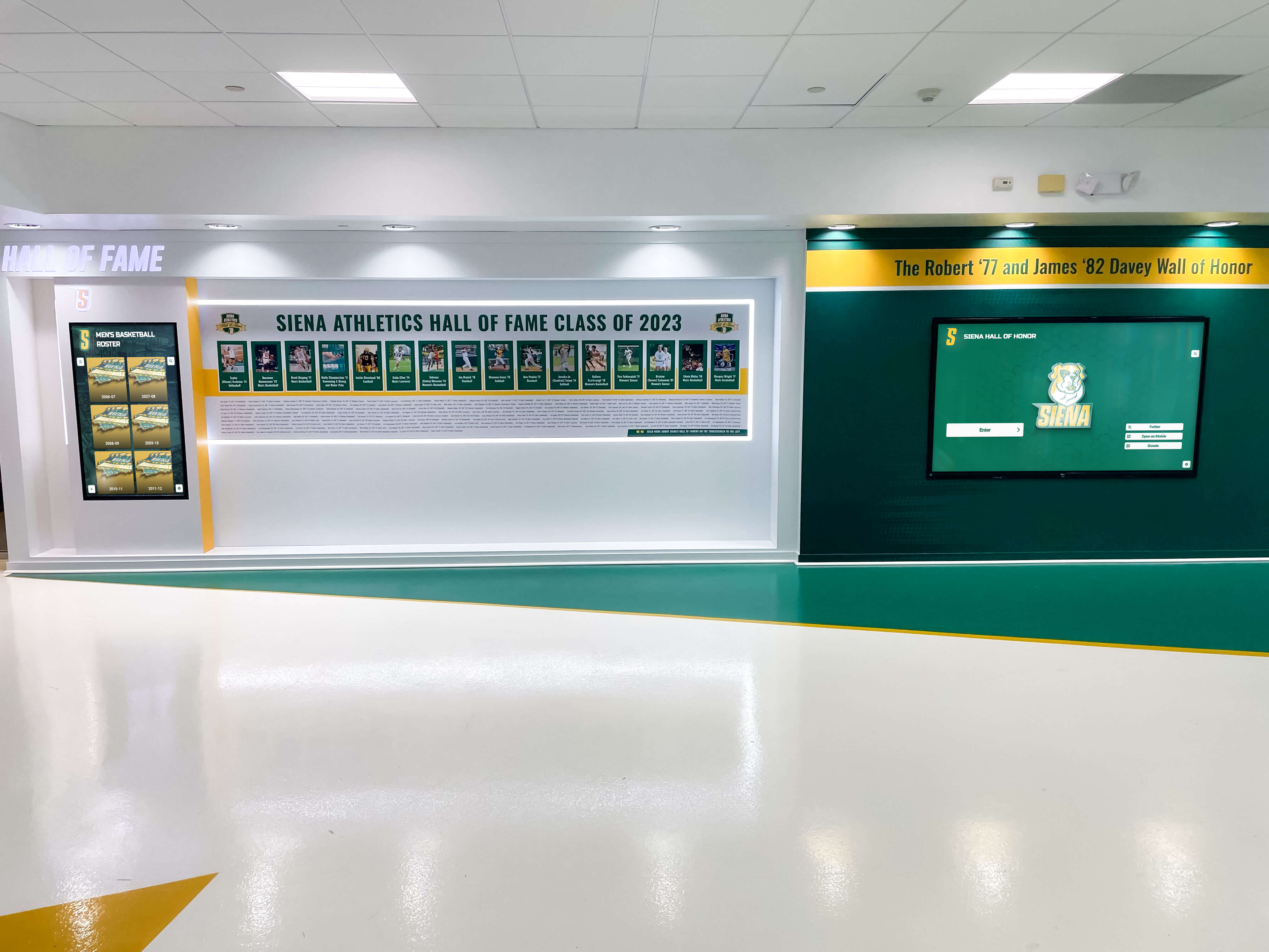 College digital display featuring class composites and alumni recognition