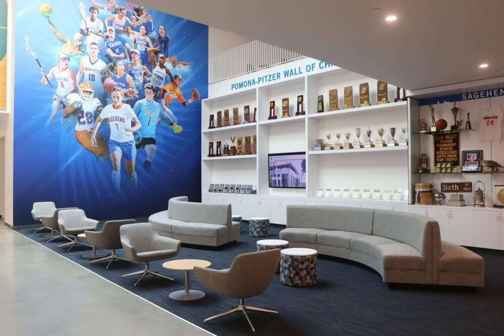 College basketball recognition area with trophy displays