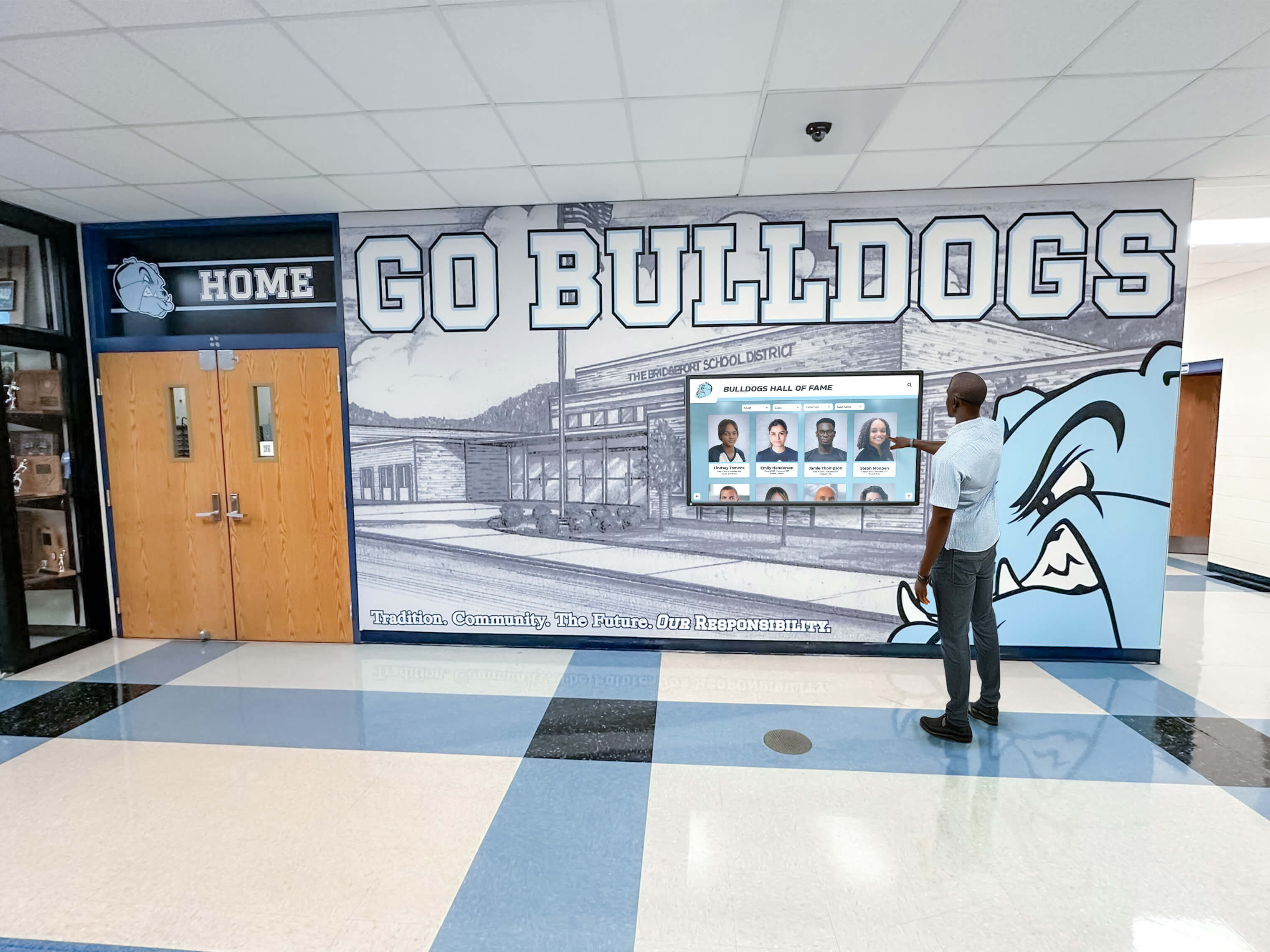 Student exploring interactive academic achievement display