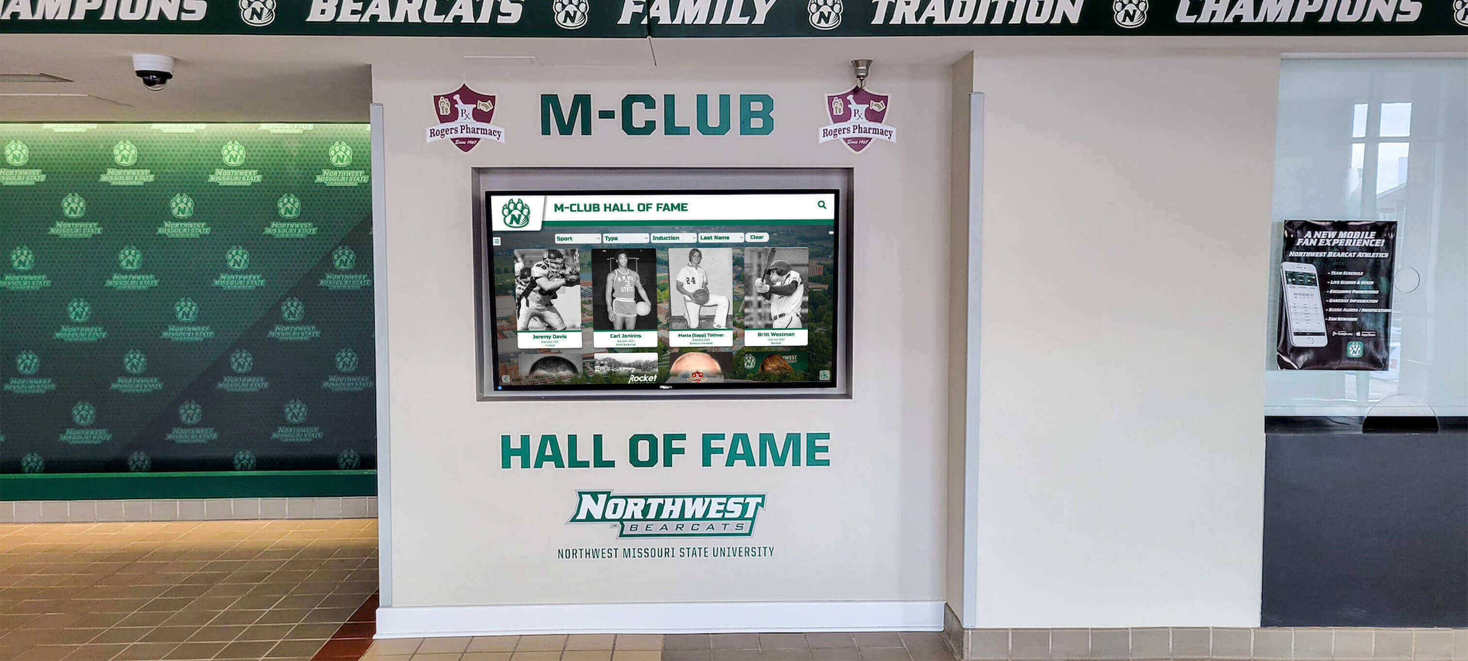 Alumni M-club hall of fame display recognizing athletic and academic achievement