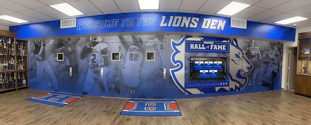 High school basketball hall of fame area with trophies